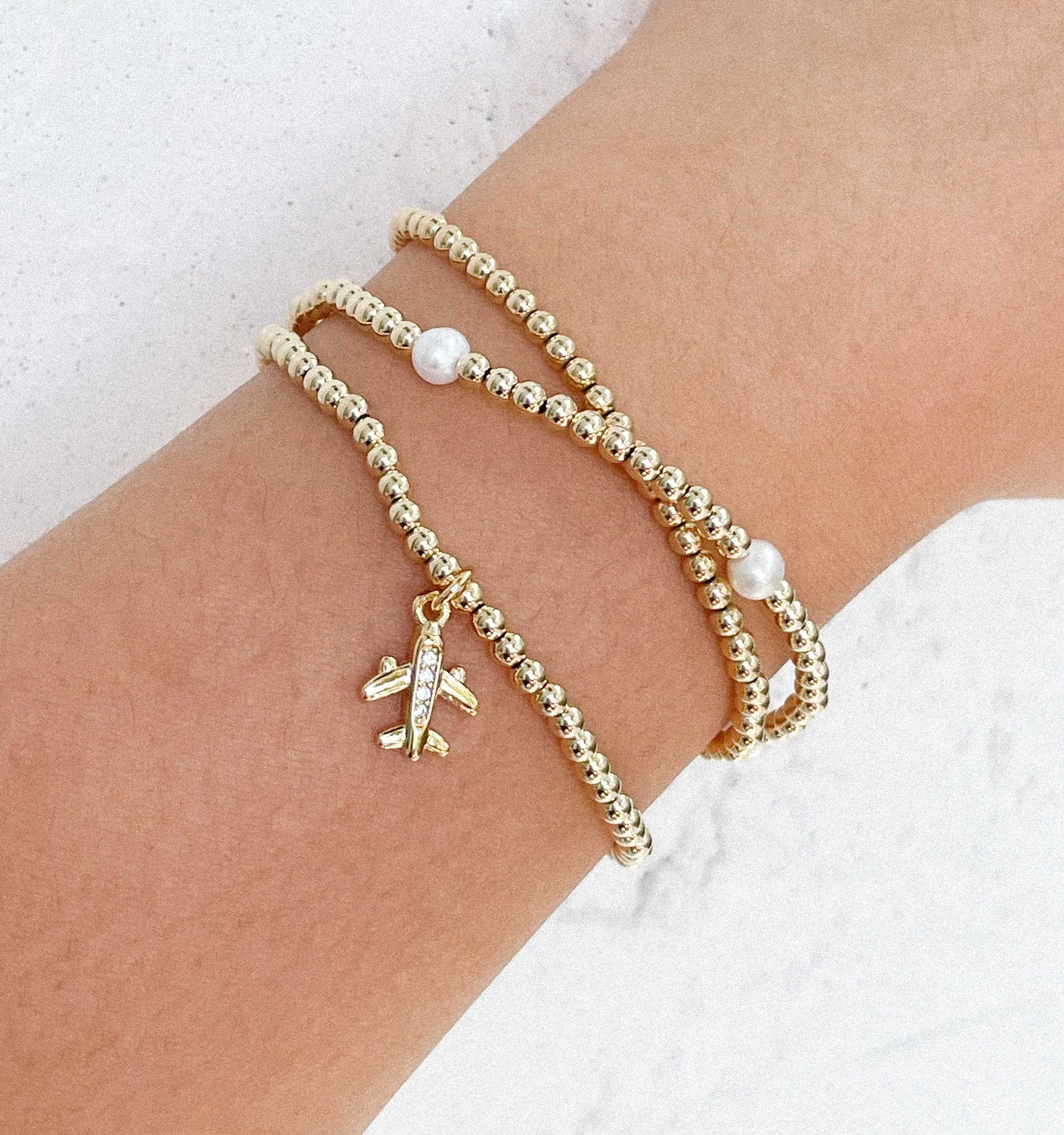 Ball Bracelet With Airplane Charm